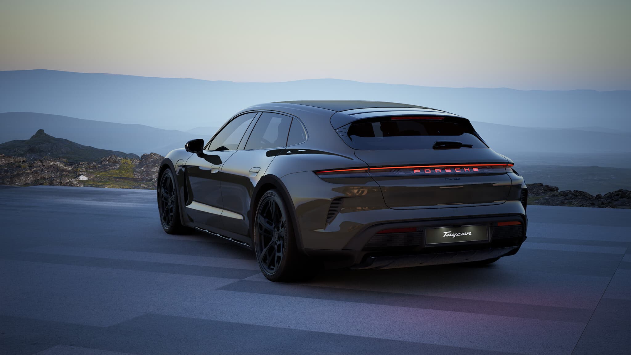 Taycan Turbo Cross Turismo 的外景,显示汽车的背面和左侧